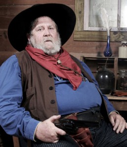 A cowboy in a rank cowboy hat